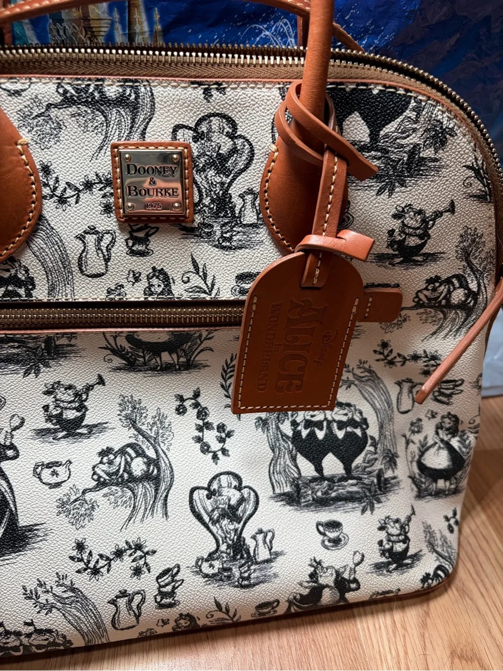 Dooney & Bourke Alice In Wonderland Women's Satchel Bag - Brown/White